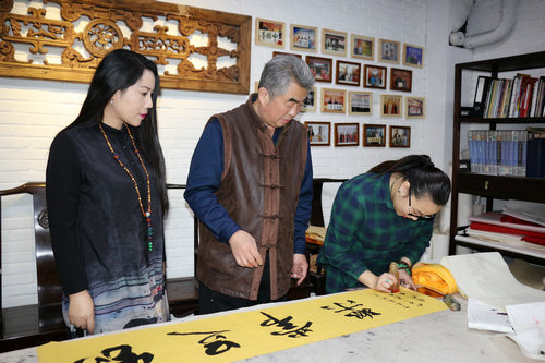 王胜利为广西“百味螺”题词 助力爱心企业新发展